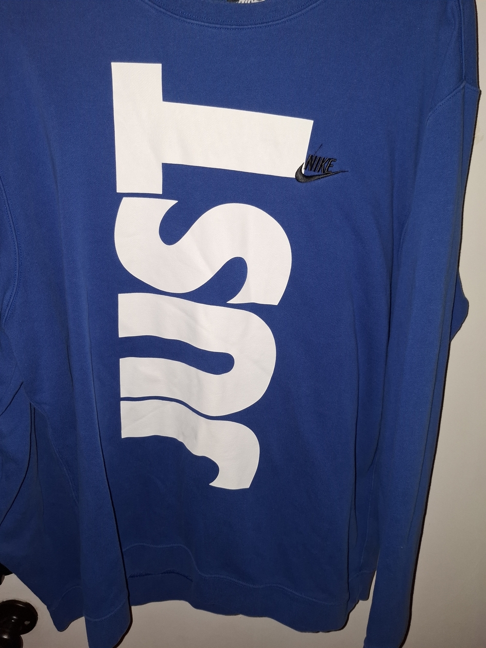 Nike Blue Long-Sleeve Men's Shirt with Bold White Graphic